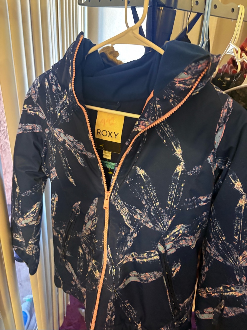 Roxy Navy Jacket with Pink Zipper and Light Blue Tag